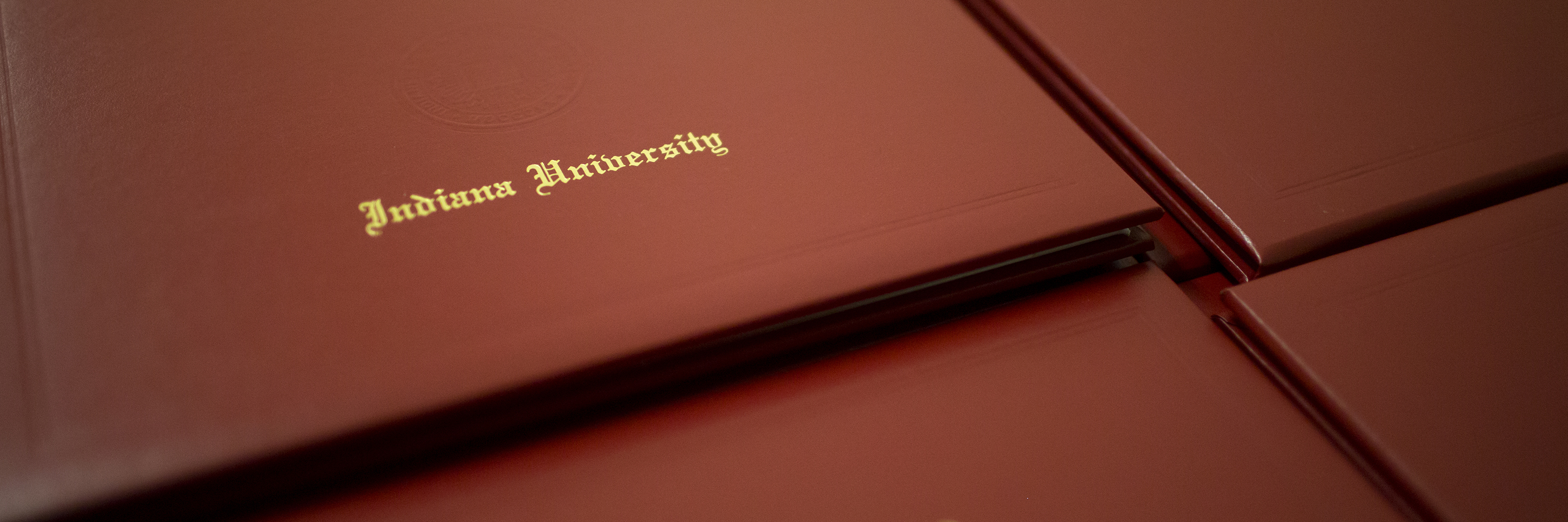 Close-up of Indiana University diploma covers. 