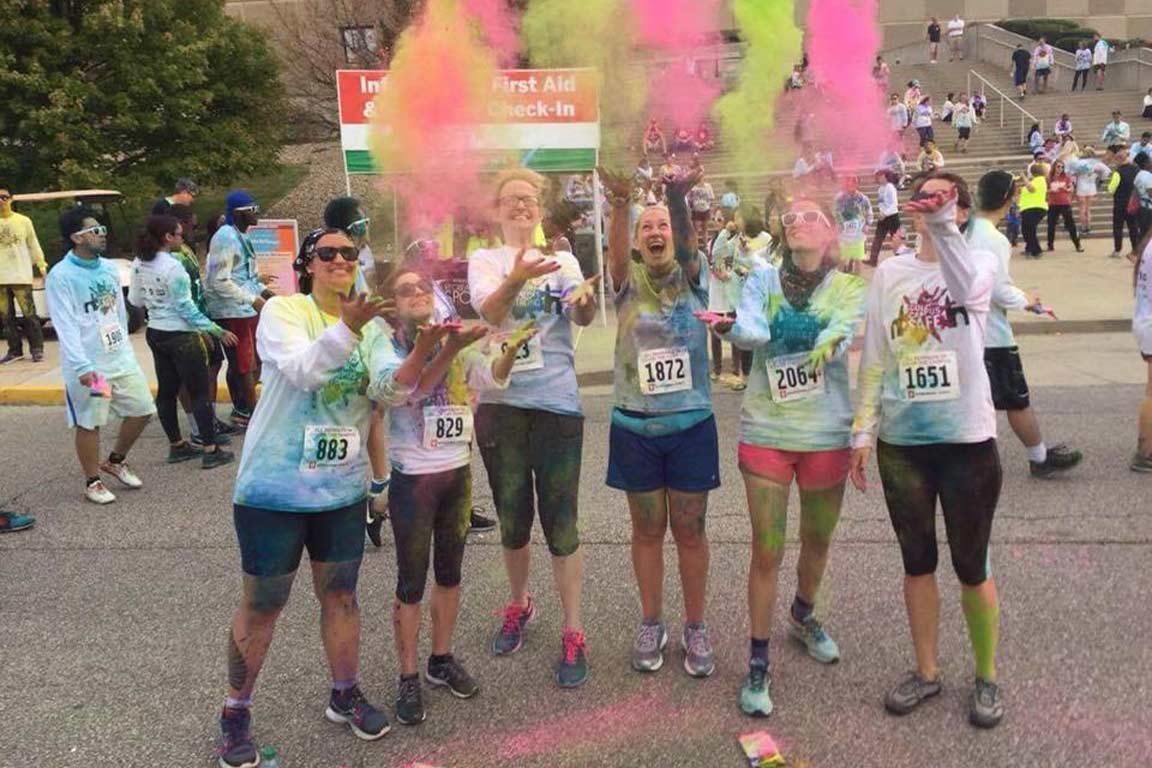 students pose at the color marathon