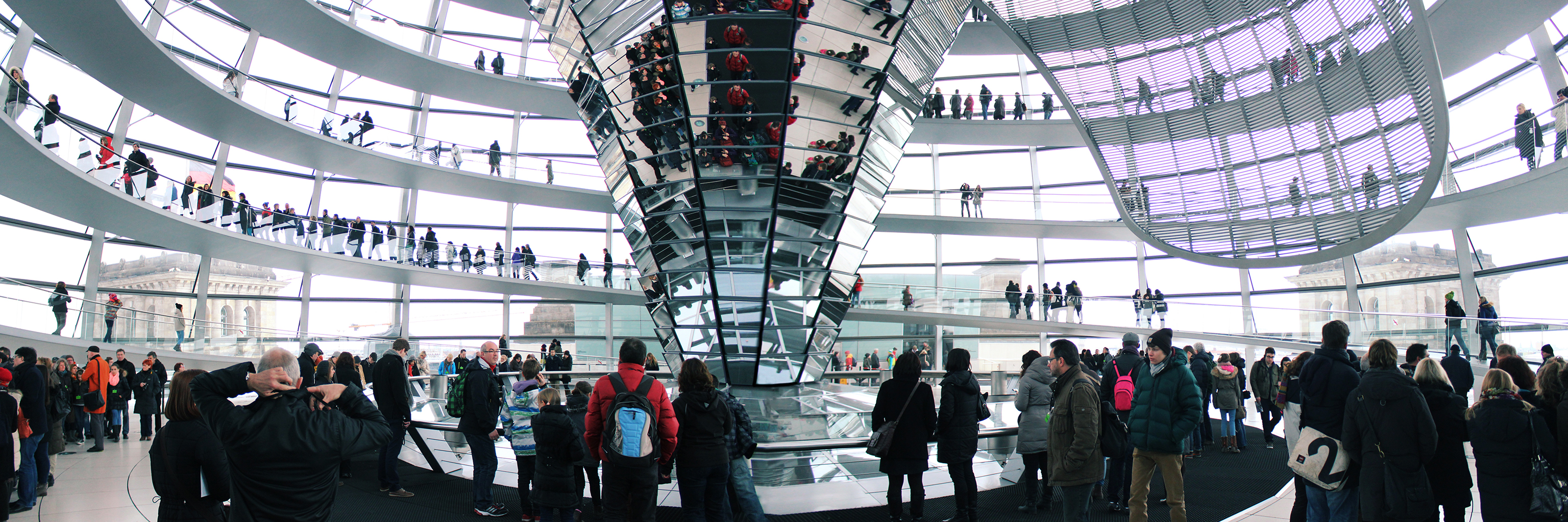 People explore the Reichstag Building in Berlin, Germany.