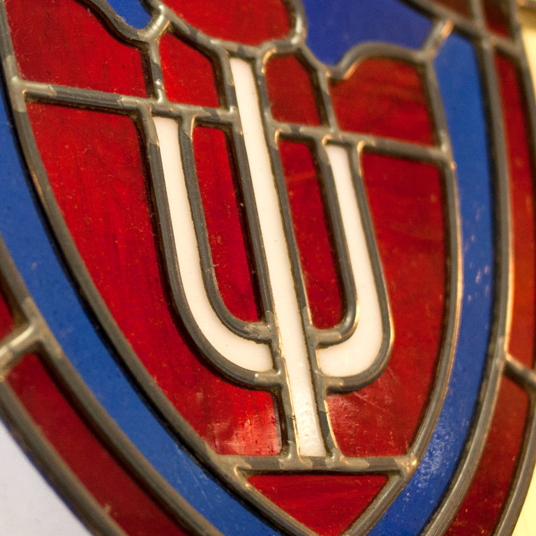Image of a stained glass Indiana University trident.